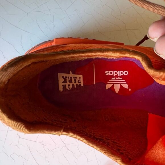 Adidas The South Park x  NMD_R1 \'Kenny\' sneakers feature a vibrant orange knit u main image 6